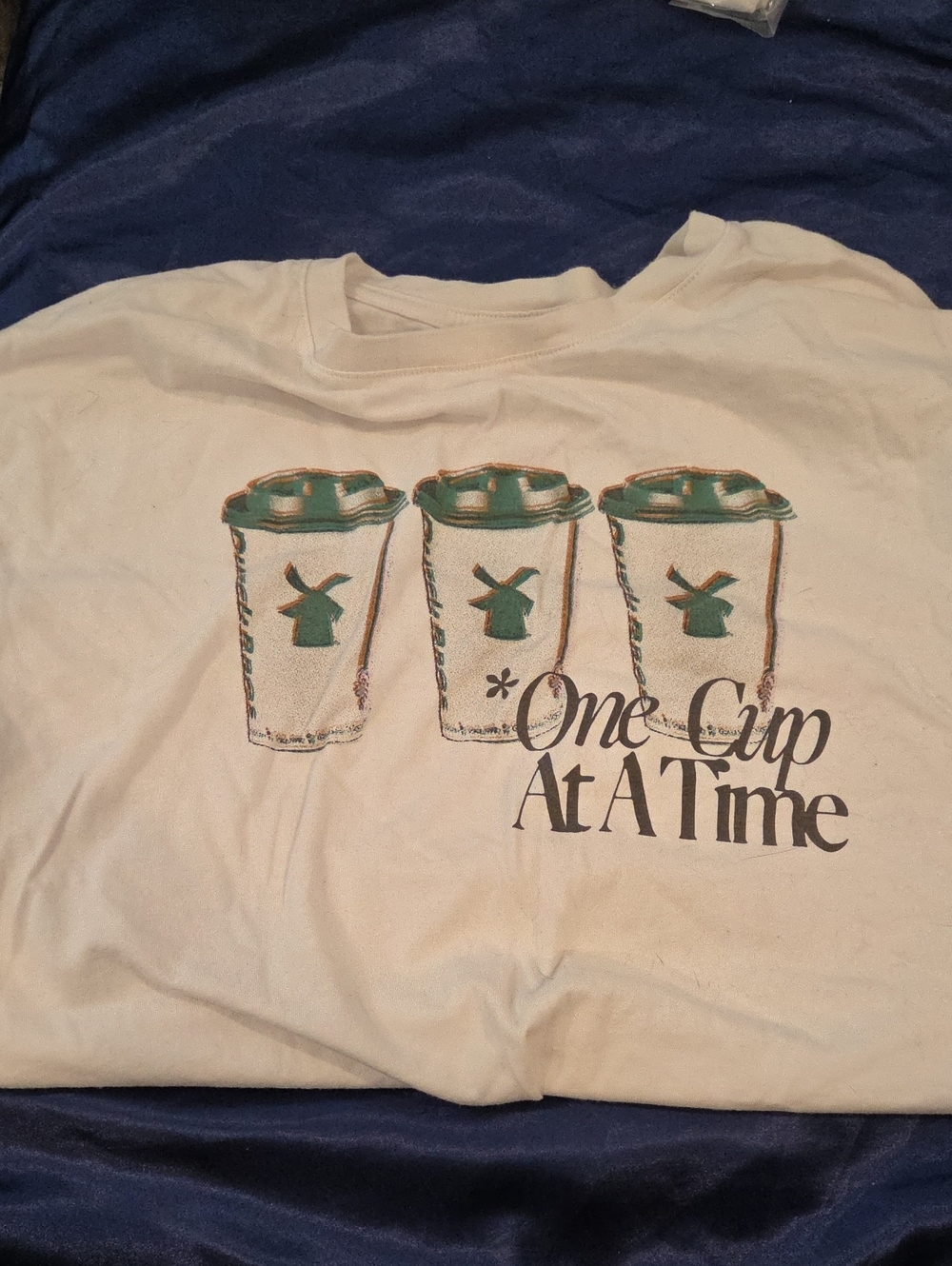 Dutch Bros White Tee with Green Cup Graphic
